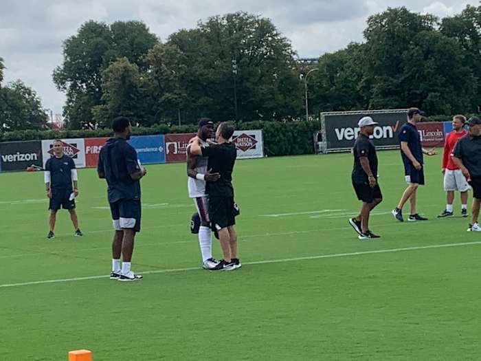 Nelson Agholor and Eagles GM Howie Roseman embrace prior to Monday's practice